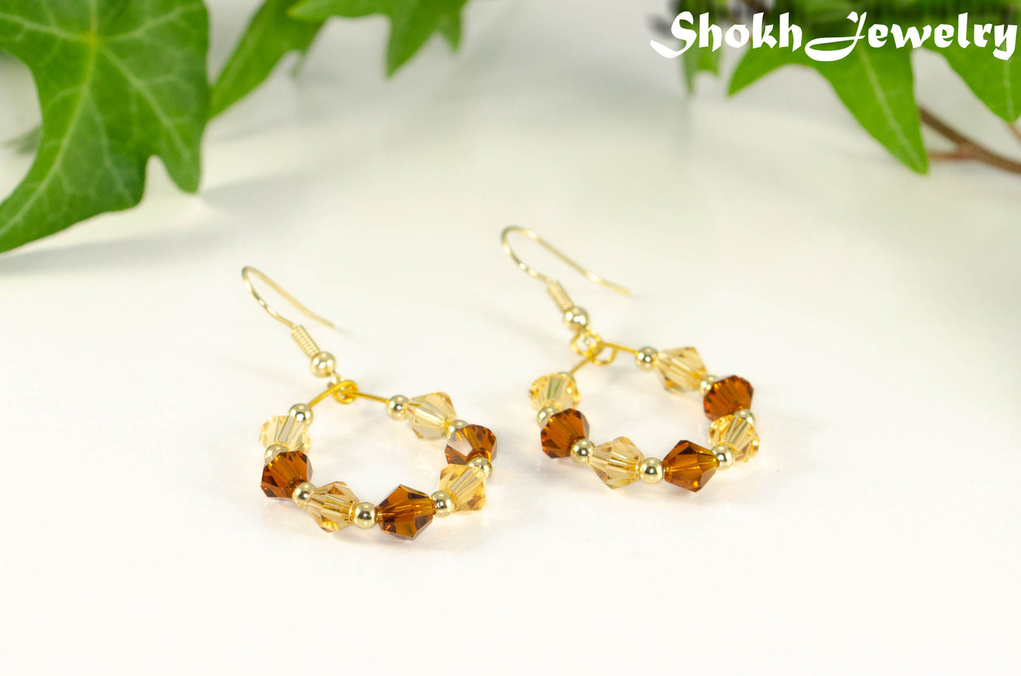 Amber and Brown Glass Crystal Hoop Earrings.