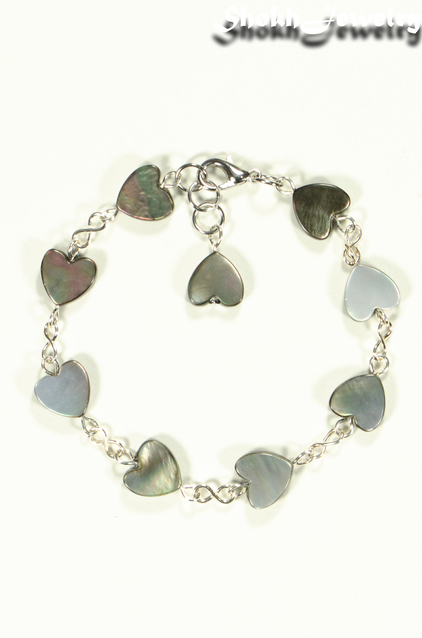 Top view of Grey Seashell Heart Link Bracelet.