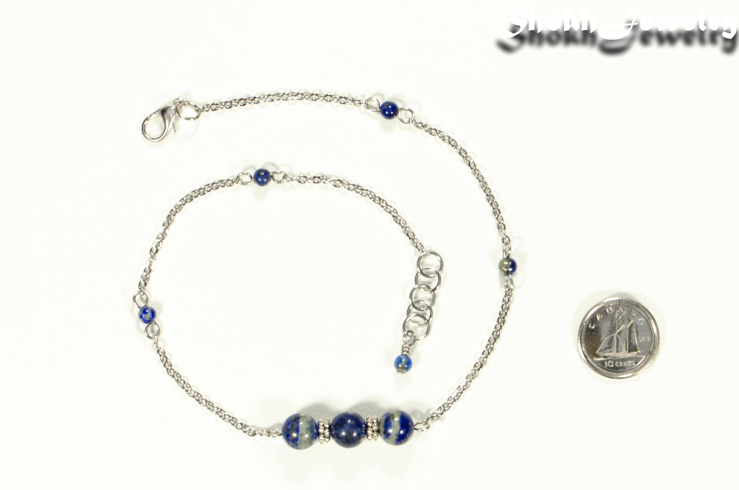 Natural Lapis Lazuli and Chain Choker Necklace beside a dime.