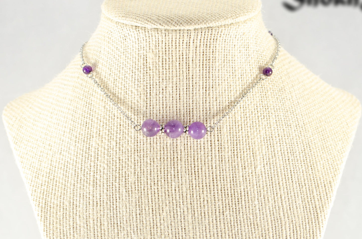 Natural Amethyst and Chain Choker Necklace displayed on a bust.