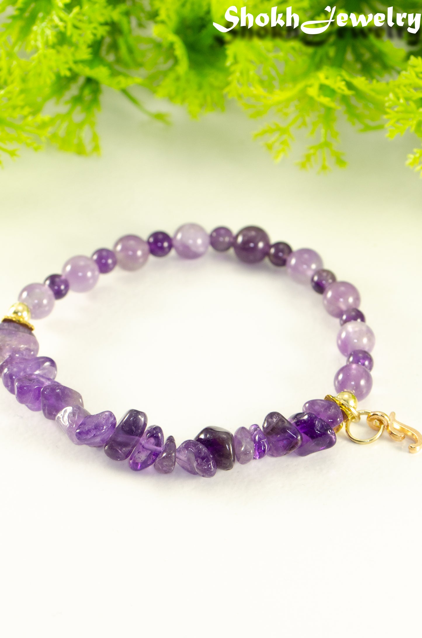 Close up of Amethyst Chip and Beads Bracelet with gold tone Initial