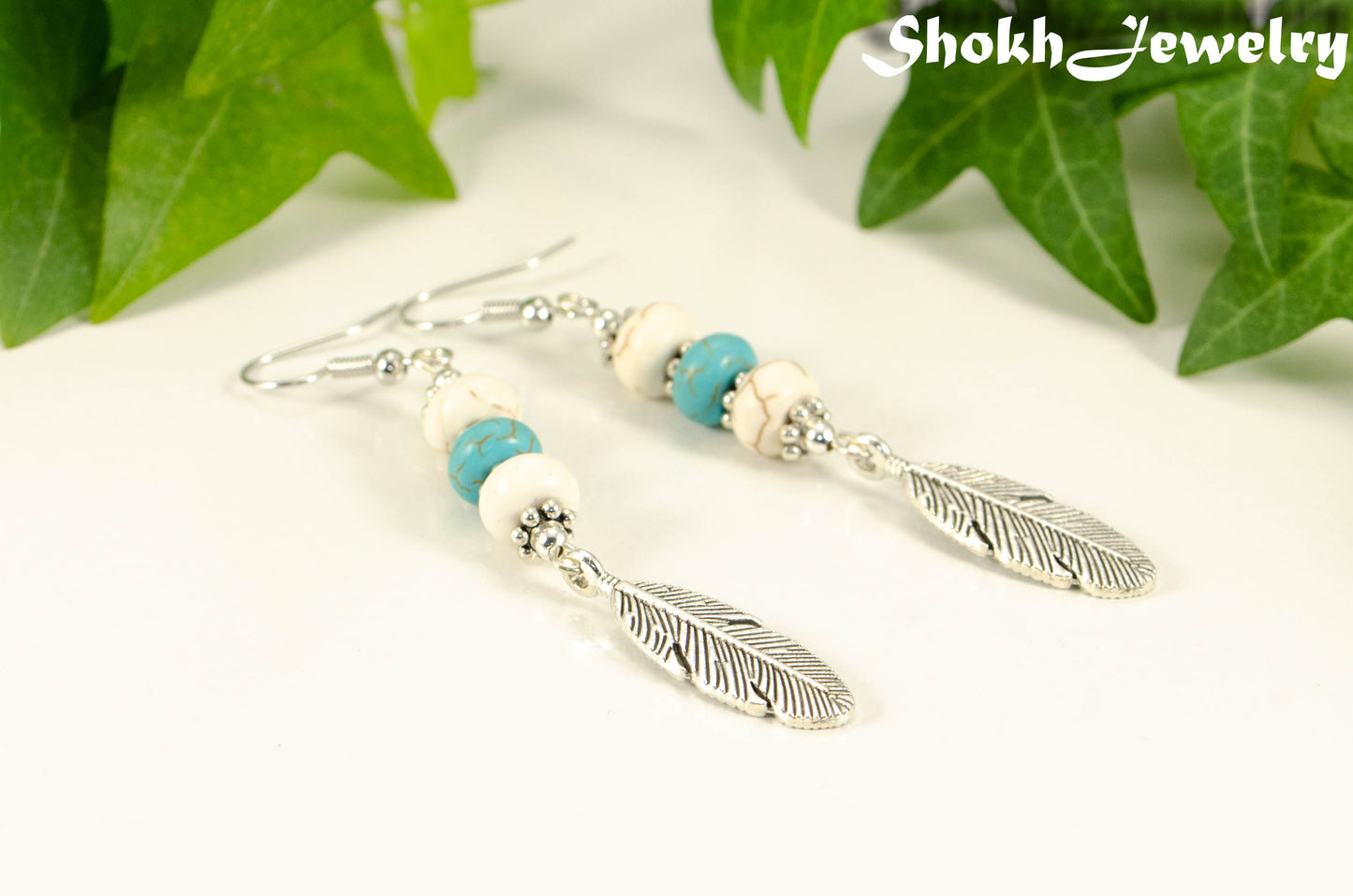 Statement White And Turquoise Howlite And Feather Earrings
