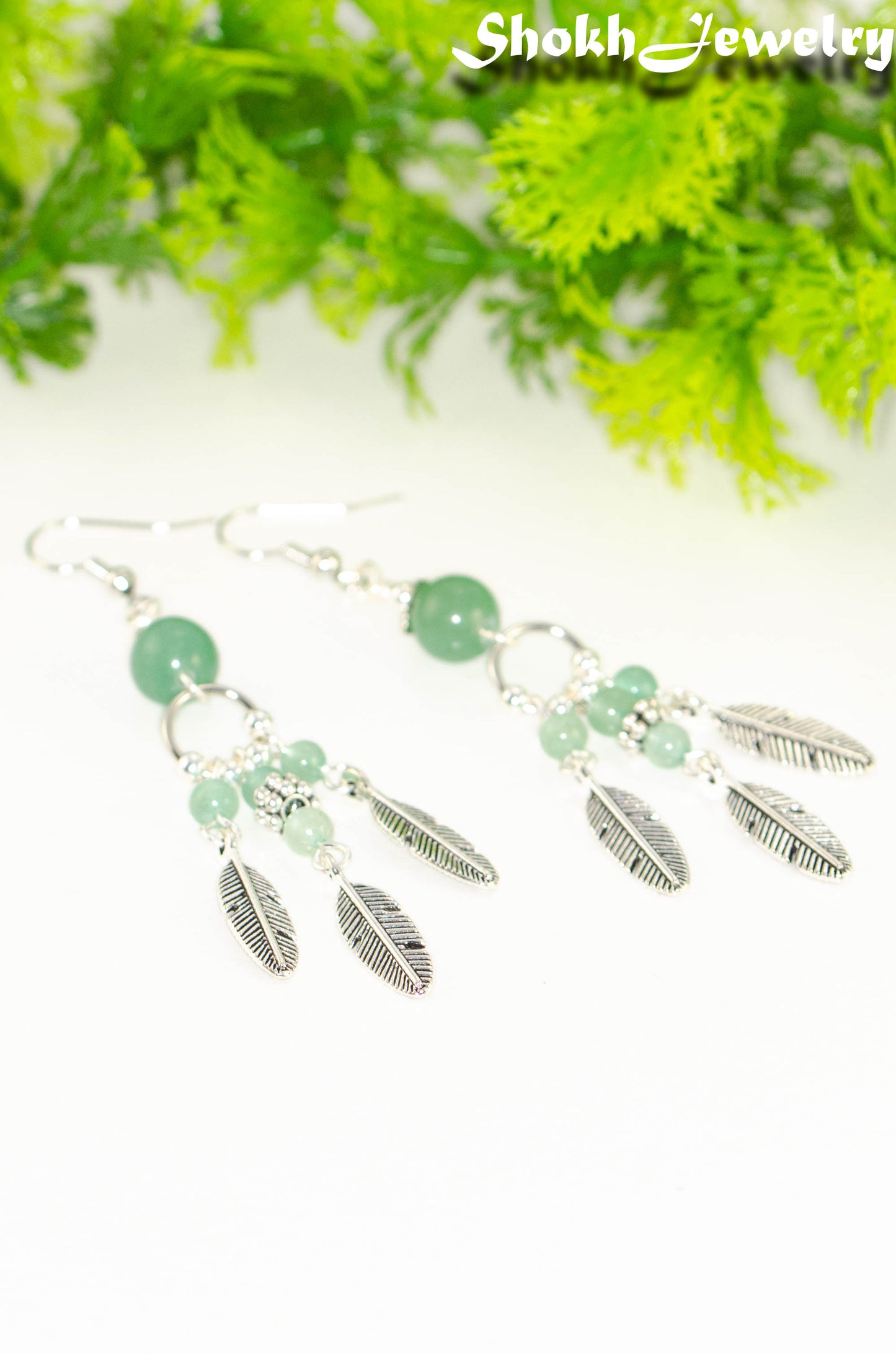 Statement Green Aventurine Crystal And Feather Earrings.