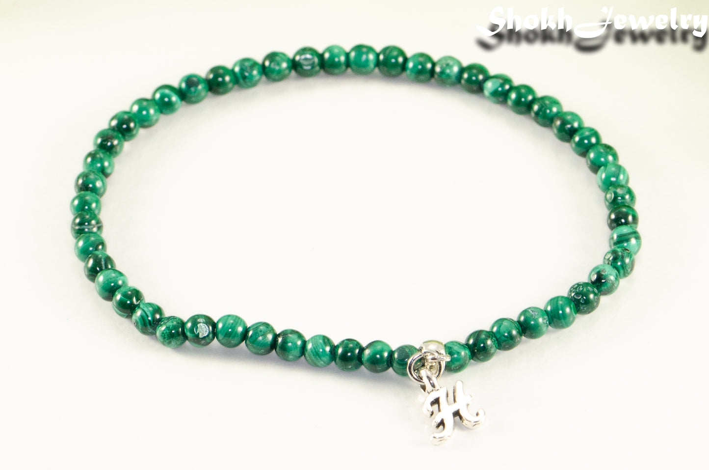 Close up of 3mm Malachite Bracelet with Initial.