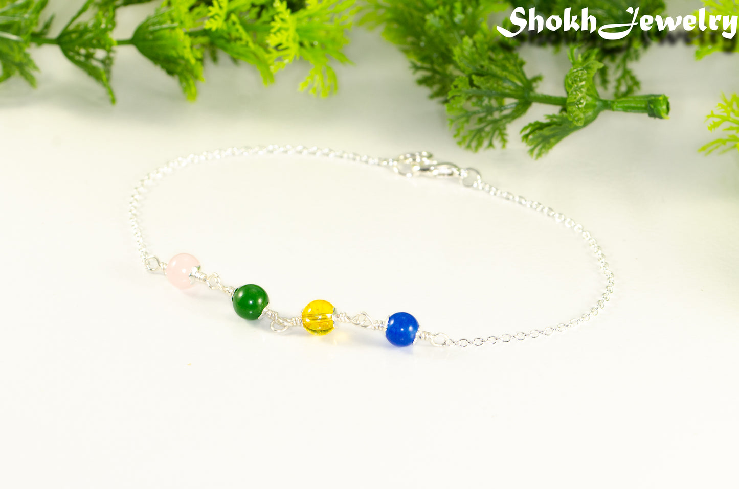 Custom Family Birthstone Bracelet with 4 gemstones.