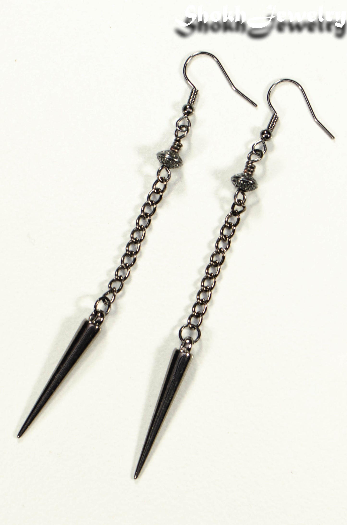 Statement chain and antique silver spike earrings