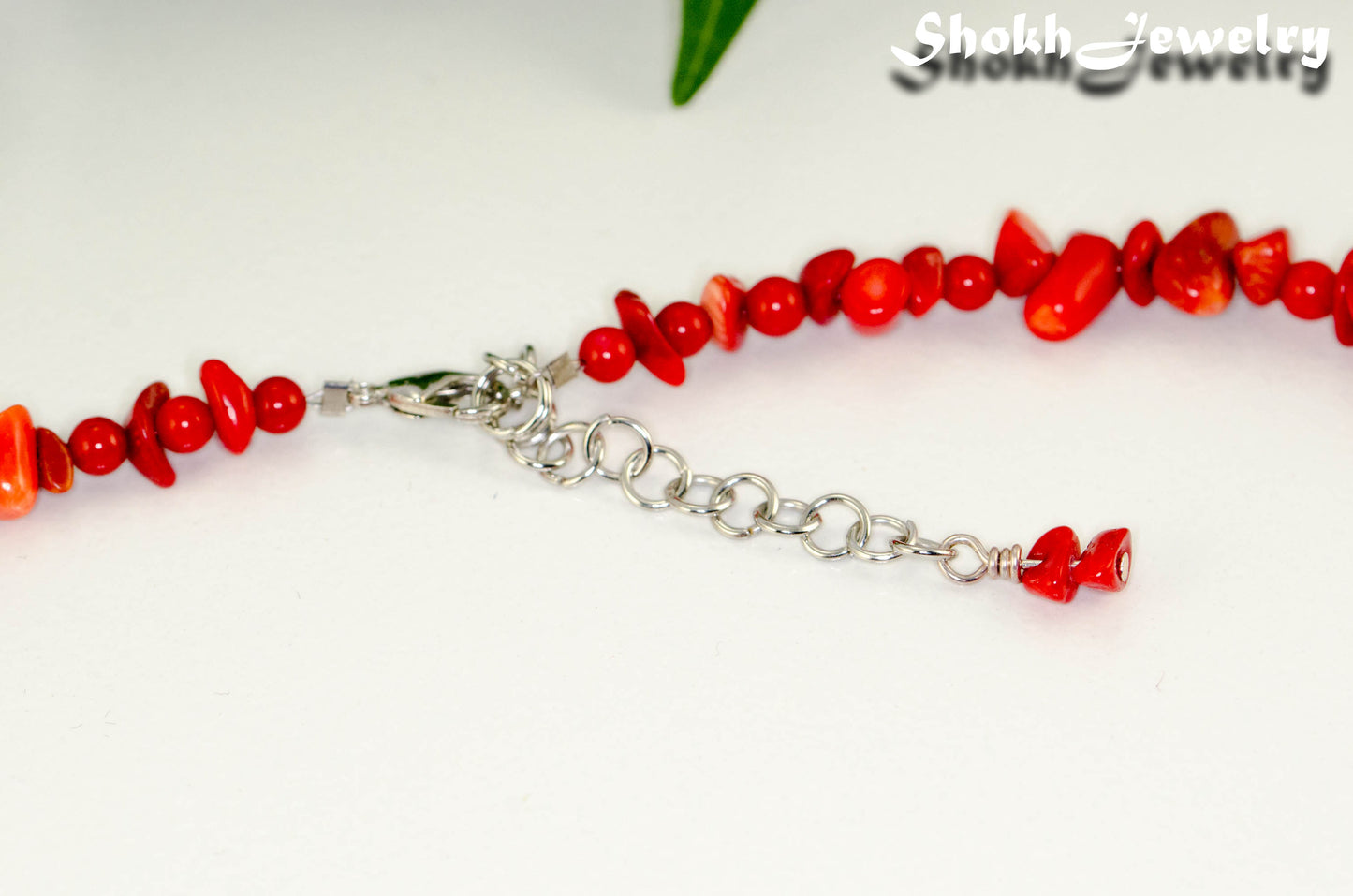 Close up of Natural Red Coral Chip Choker Necklace.