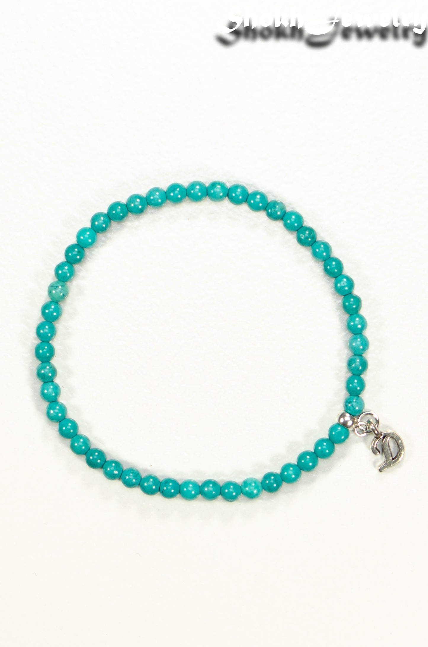 Top view of 4mm Turquoise Bracelet with Initial.