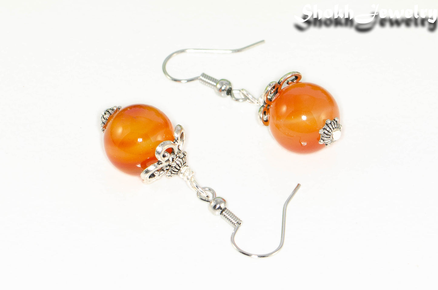 Close up of 12mm Natural Carnelian Crystal Earrings