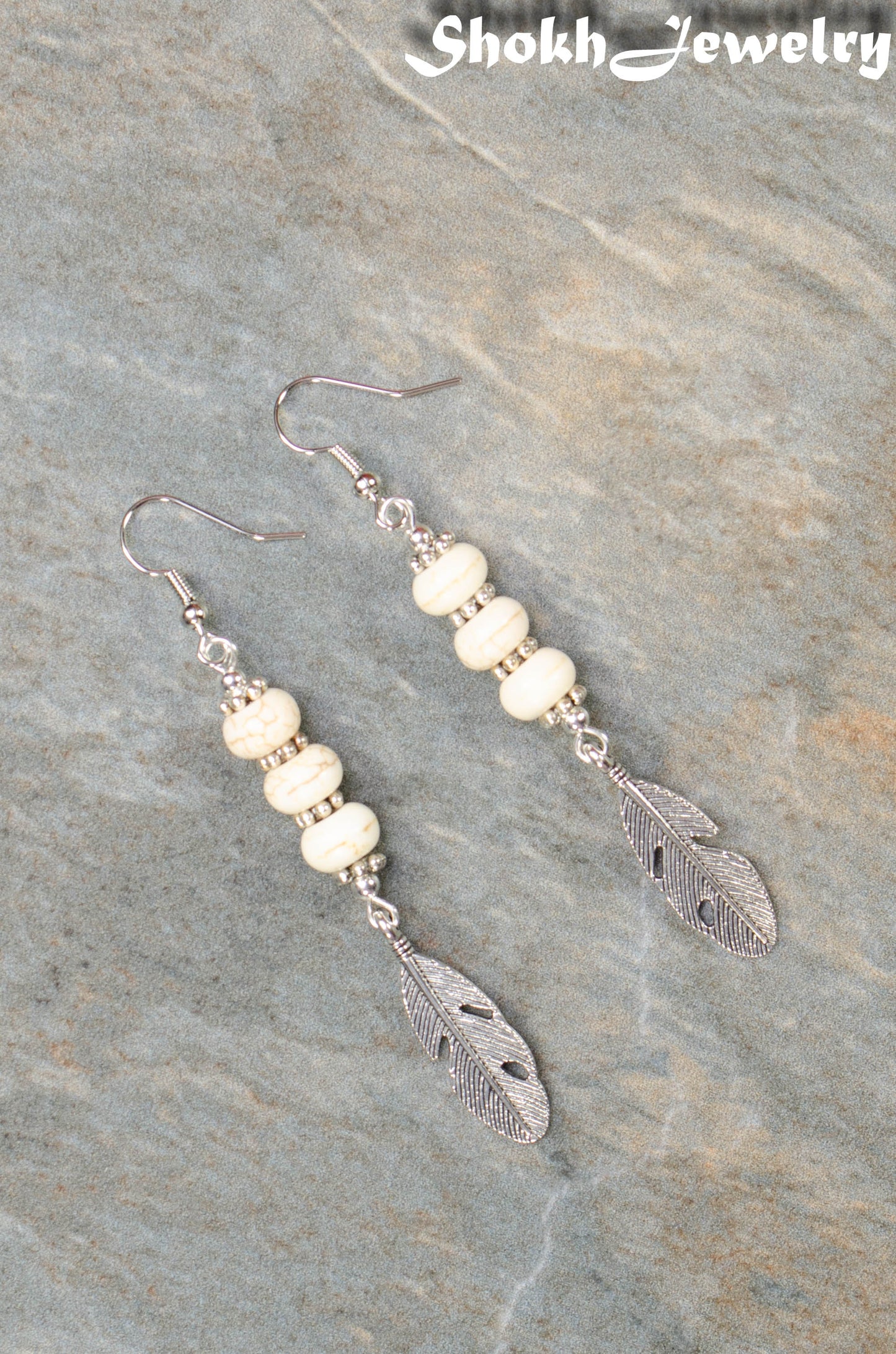 Statement White Howlite And Tibetan Silver Feather Earrings.