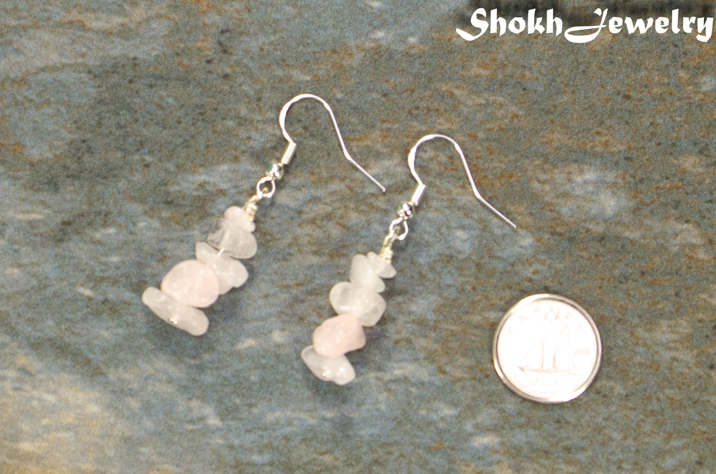 Simple Rose Quartz Crystal Chip Earrings beside a dime.
