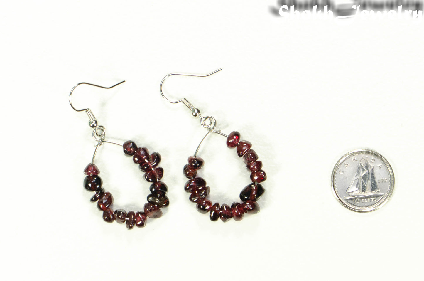 Natural Garnet Crystal Chip Earrings beside a dime