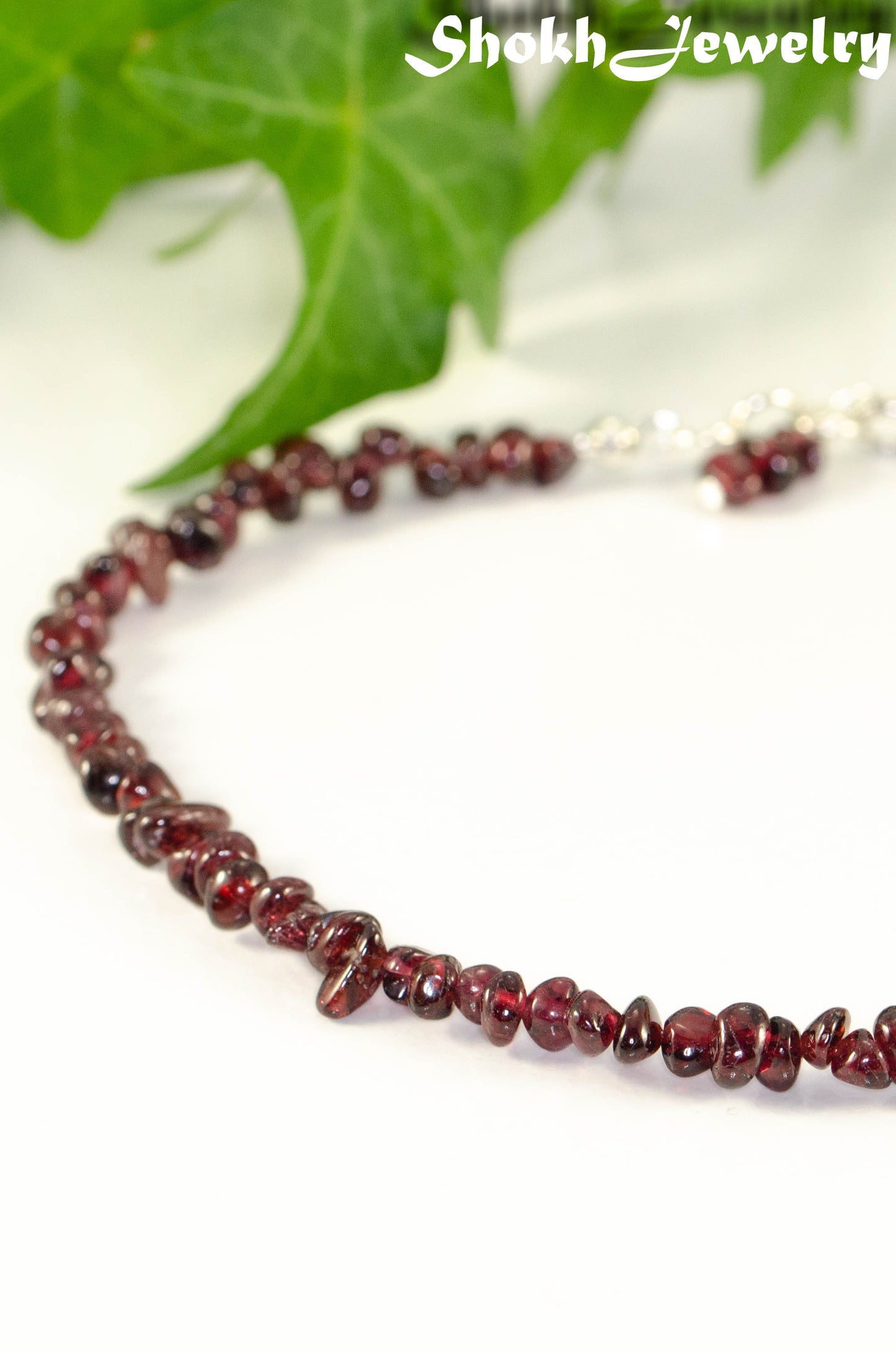 Close up of Natural Garnet Crystal Chip Anklet