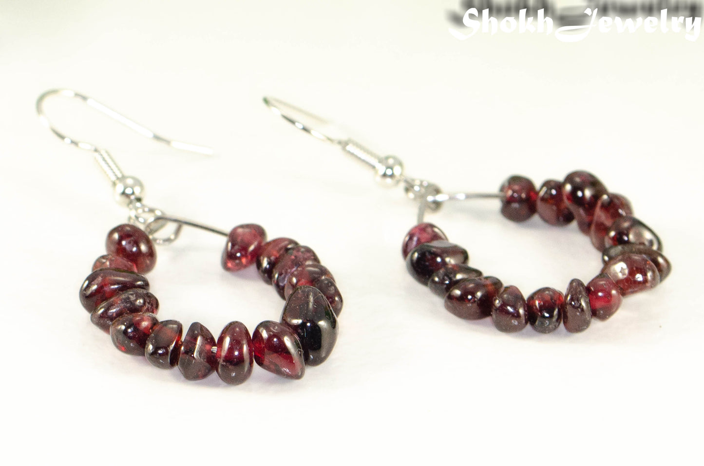 Close up of Natural Garnet Crystal Chip Earrings