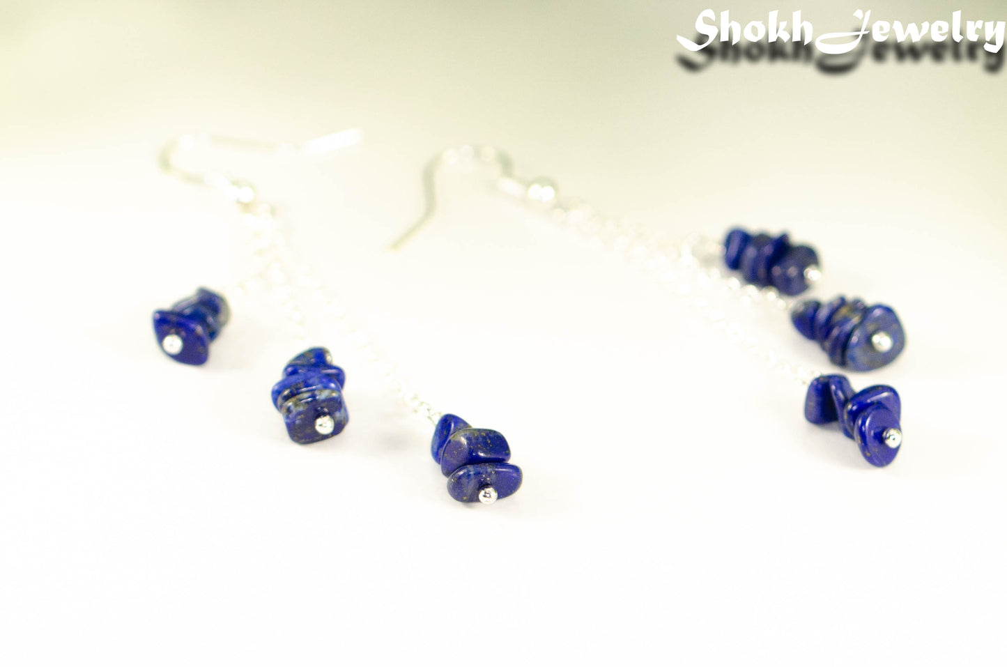Close up of Long Silver Plated Chain and Lapis Lazuli Chip Earrings