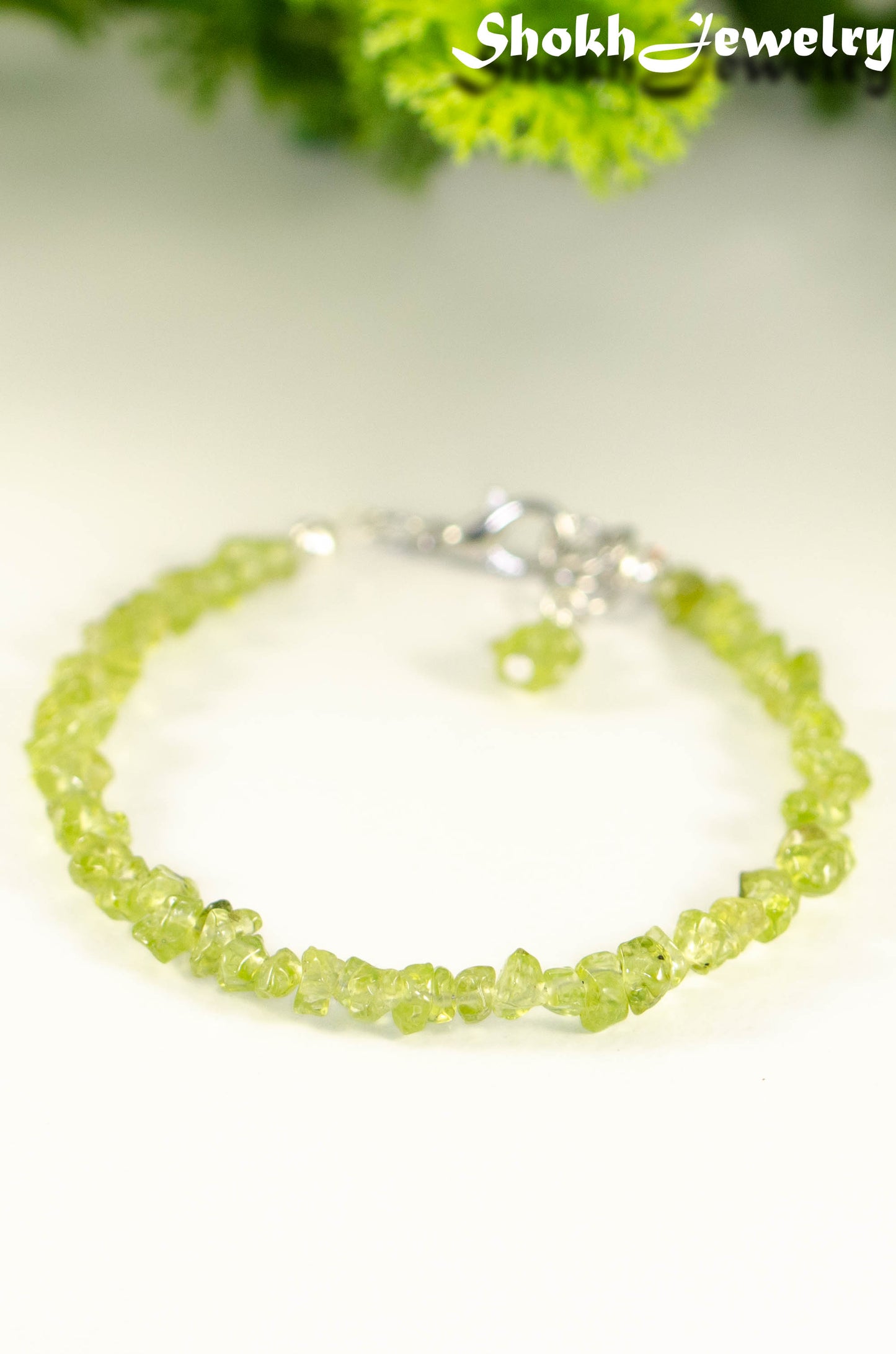 Close up of Natural Peridot Crystal Chip Bracelet