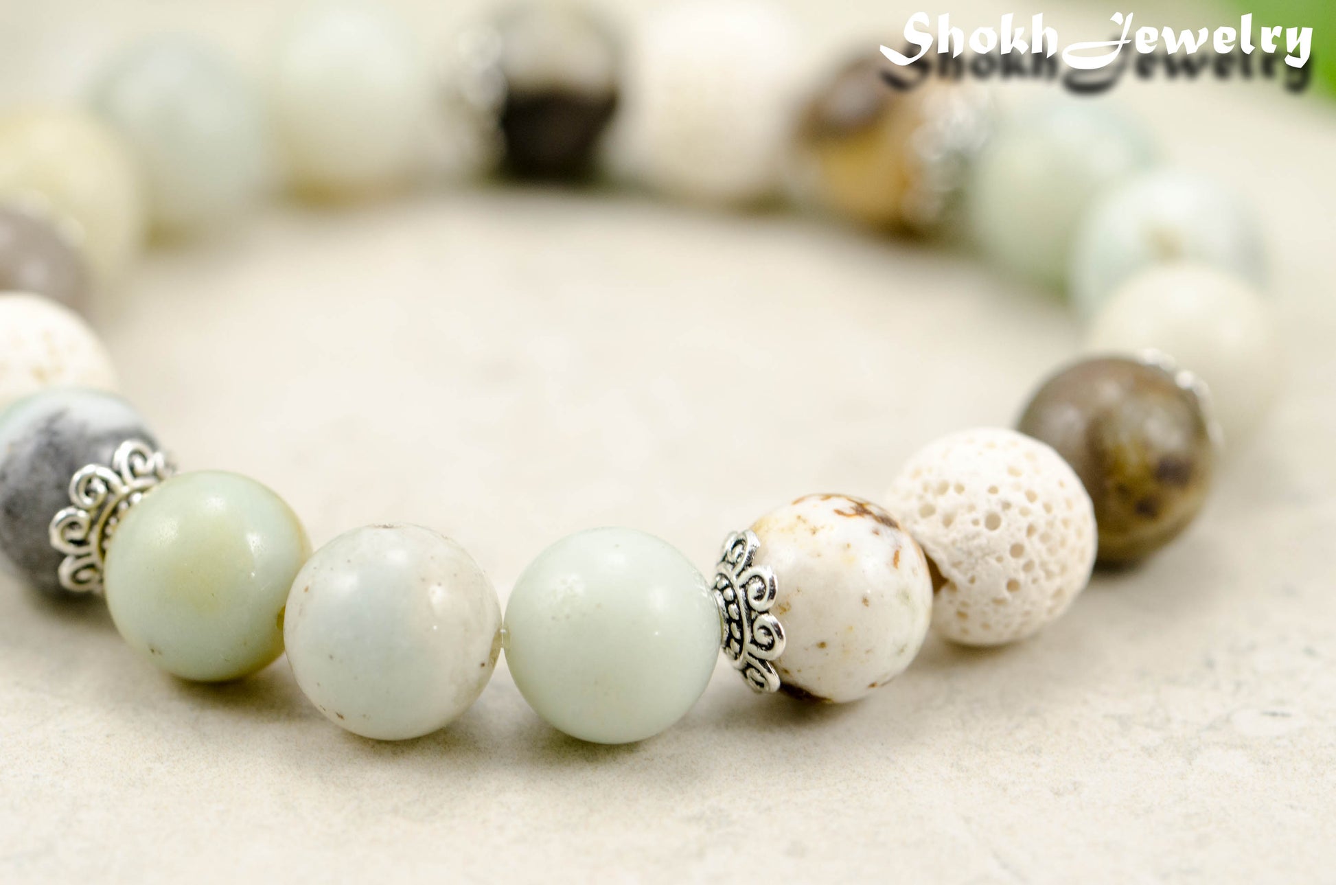 Close up of 10mm Amazonite and Lava Stone Bracelet.