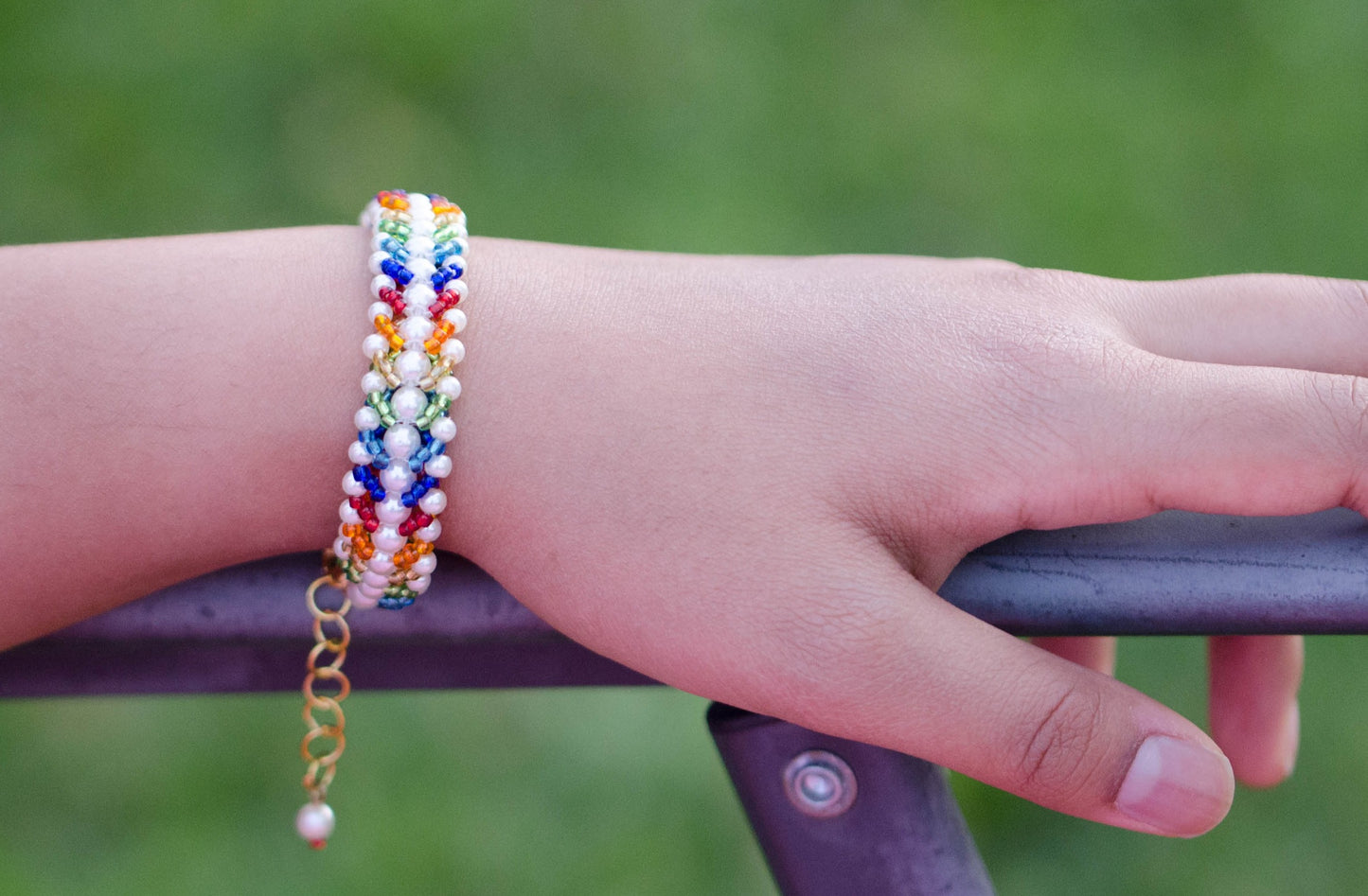 Rainbow seed bead and pearl woven bracelet