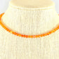 4mm Carnelian Crystal Choker Necklace displayed on a bust.