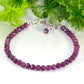 4mm Faceted Ruby Anklet made with raw ruby crystal beads strung on sturdy bead stringing wire, finished with a lobster clasp and 0.5 inch extender chain and a cute little dangle.
