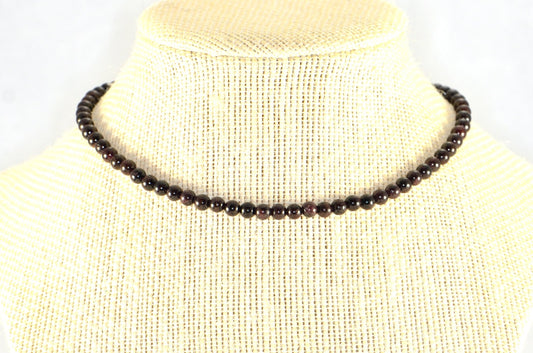 4mm Garnet Crystal Choker Necklace displayed on a bust.