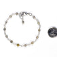 4mm Labradorite Link Chain Bracelet beside a dime.