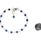 4mm Lapis Lazuli Link Chain Bracelet beside a dime.