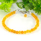 Natural Citrine Anklet made with 4mm natural citrine beads strung on sturdy bead stringing wire, finished with a lobster clasp.