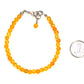 4mm Natural Citrine Anklet beside a dime.