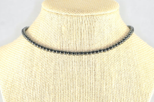 4mm Natural Hematite Choker Necklace displayed on a bust.