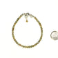 4mm Natural Labradorite Bracelet with Clasp beside a dime.