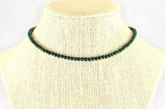 4mm Natural Malachite Choker Necklace displayed on a bust.