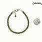 4mm Natural Pyrite anklet with Clasp beside a dime.