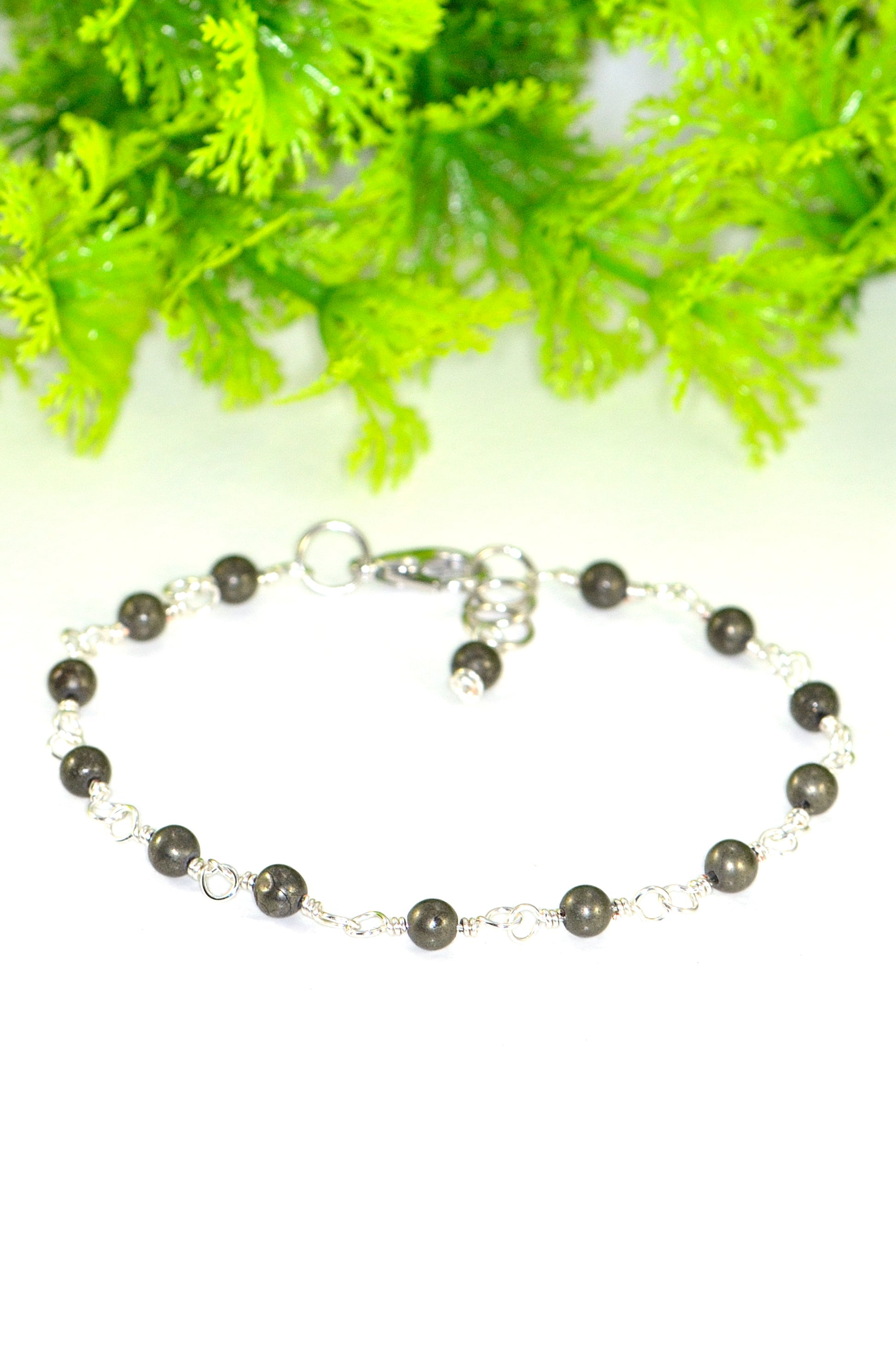 Close up of 4mm Natural Pyrite Link Bracelet .