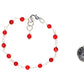 4mm Natural Red Dyed Coral Link Bracelet beside a dime.