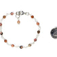 4mm Natural Rhodonite Link Anklet  beside a dime