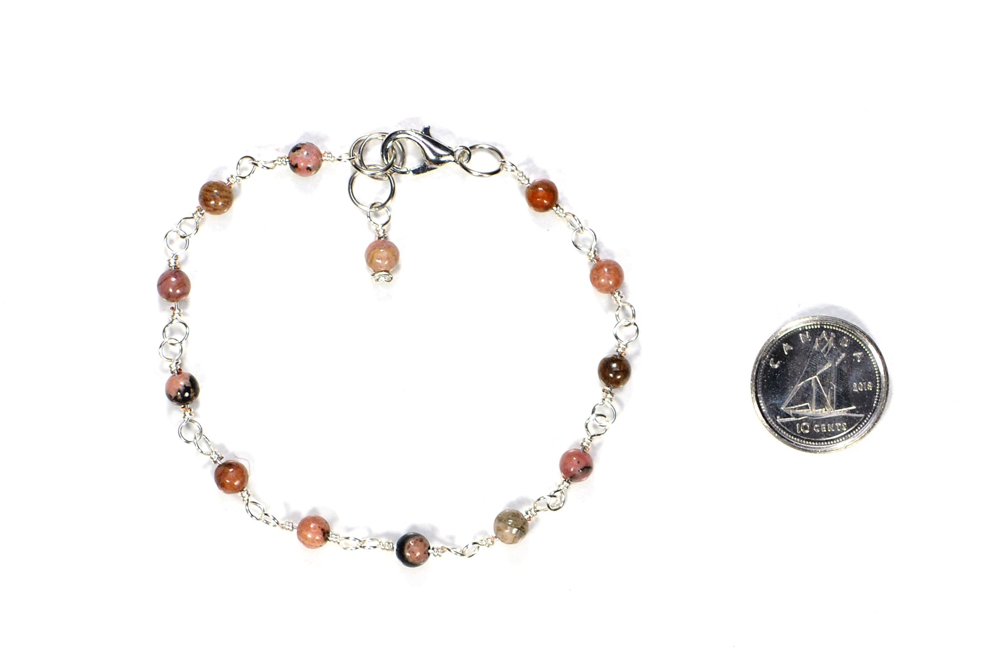 4mm Natural Rhodonite Link Anklet  beside a dime