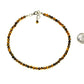 4mm Natural Tiger's Eye Choker Necklace beside a dime.
