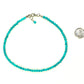 4mm Natural Turquoise Choker Necklace beside a dime.