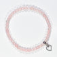 Top view of 4mm Rose Quartz Bracelet with Heart Charm.