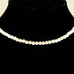 4mm Rose Quartz Crystal Choker Necklace displayed on a bust.