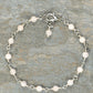 Top view of 4mm Rose Quartz Link Bracelet.