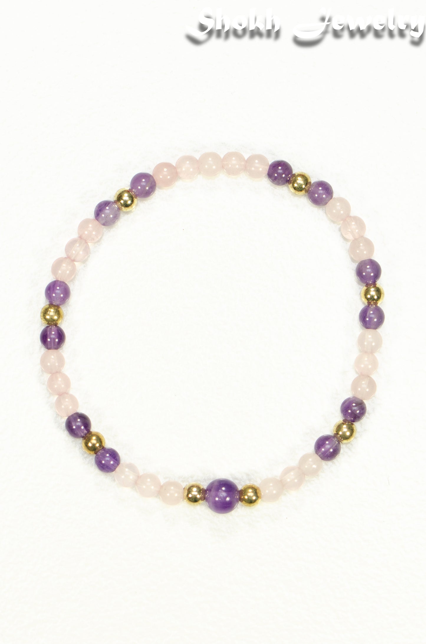 Top view of 4mm Rose Quartz and Amethyst Bracelet.