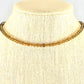 4mm Smokey Quartz Crystal Choker Necklace displayed o a bust.