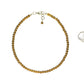 4mm Smokey Quartz Crystal Choker Necklace beside a dime.