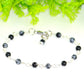 Close up of 4mm Snowflake Obsidian Link Chain Bracelet.