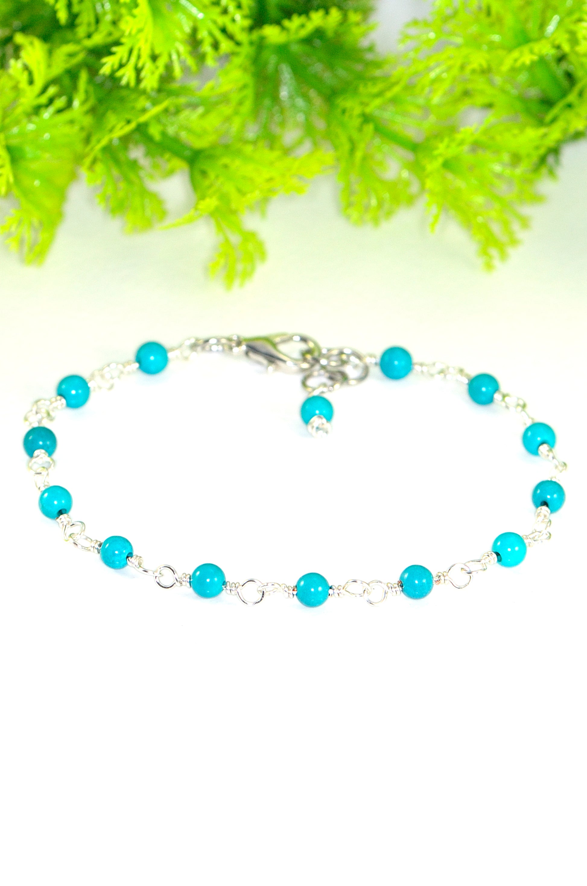 Close up of 4mm Turquoise Beaded Link Bracelet.