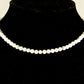 4mm White Howlite Choker Necklace displayed on a bust.