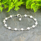 4mm White Howlite Link Bracelet with lobster claw clasp.