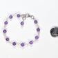 Handmade 6mm Amethyst Link Bracelet beside a dime.